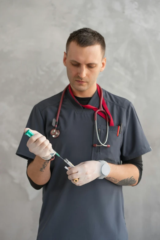 a man with a stethoscope in his hand, trending on reddit, holding a syringe, partially cupping her hands, concentrated, 2019 trending photo