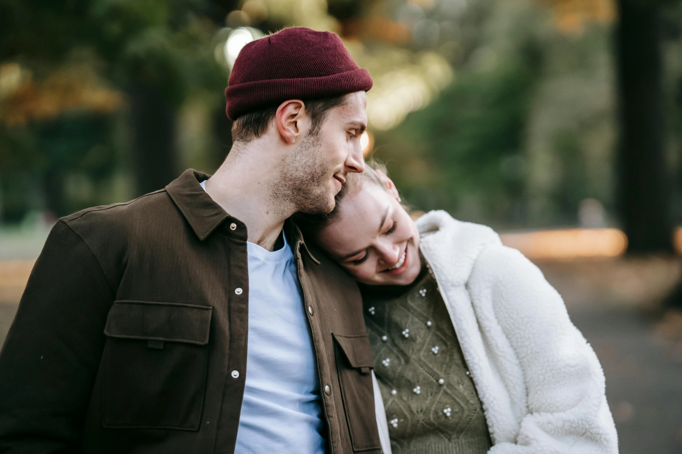 a man and a woman standing next to each other, a photo, by Emma Andijewska, pexels contest winner, happy cozy feelings, 15081959 21121991 01012000 4k, in a park, medium close up