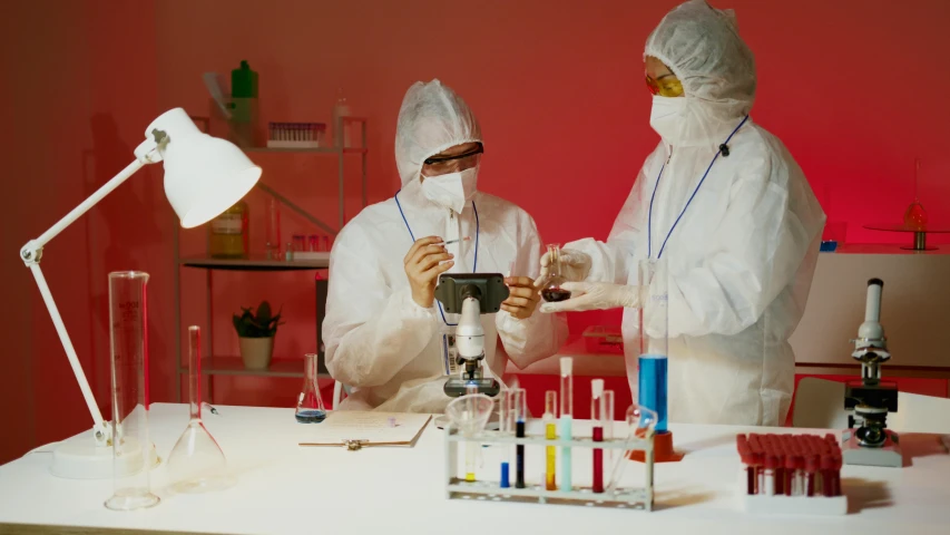 a couple of people that are in a lab, pexels contest winner, still from a wes anderson film, sterile colours, graphene, thumbnail