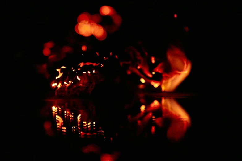 a couple of candles sitting on top of a table, a digital rendering, by Jan Rustem, digital art, fire reflection, dragon made out of molten lava, taken with a pentax k1000, bokeh. brian spilner