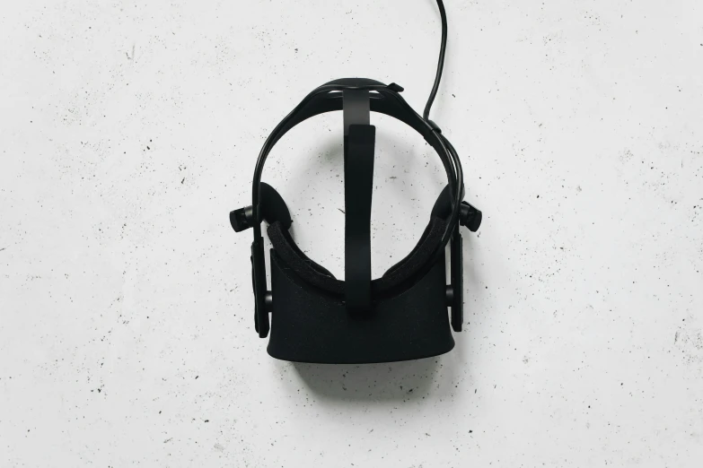 a pair of headphones sitting on top of a table, oculus rift, anato finnstark. front view, black harness, untextured