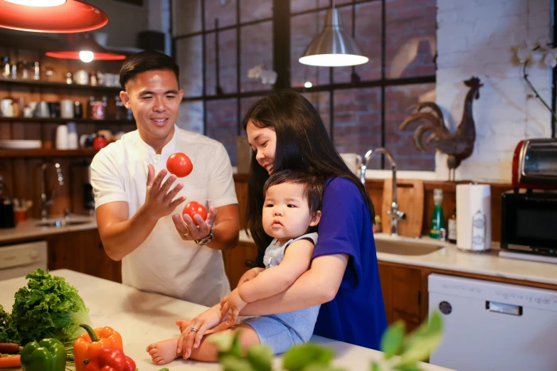 a family is preparing a meal in the kitchen, pexels contest winner, avatar image, asian male, professional image, thumbnail