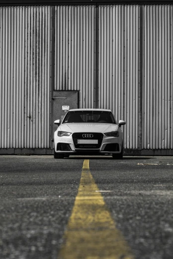 a white car parked in front of a building, unsplash, asphalt and metal, with a white muzzle, style of flavie audi, f32