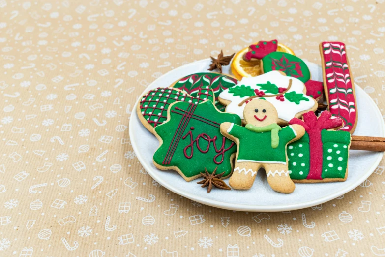 a plate that has some cookies on it, by Emma Andijewska, pexels, naive art, background image, christmas, cute photo, diecut