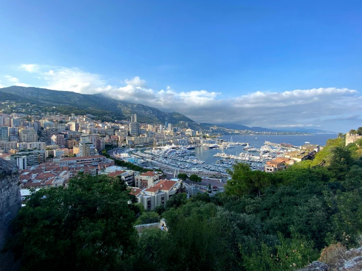 a view of a city from the top of a hill, monaco, avatar image, watch photo