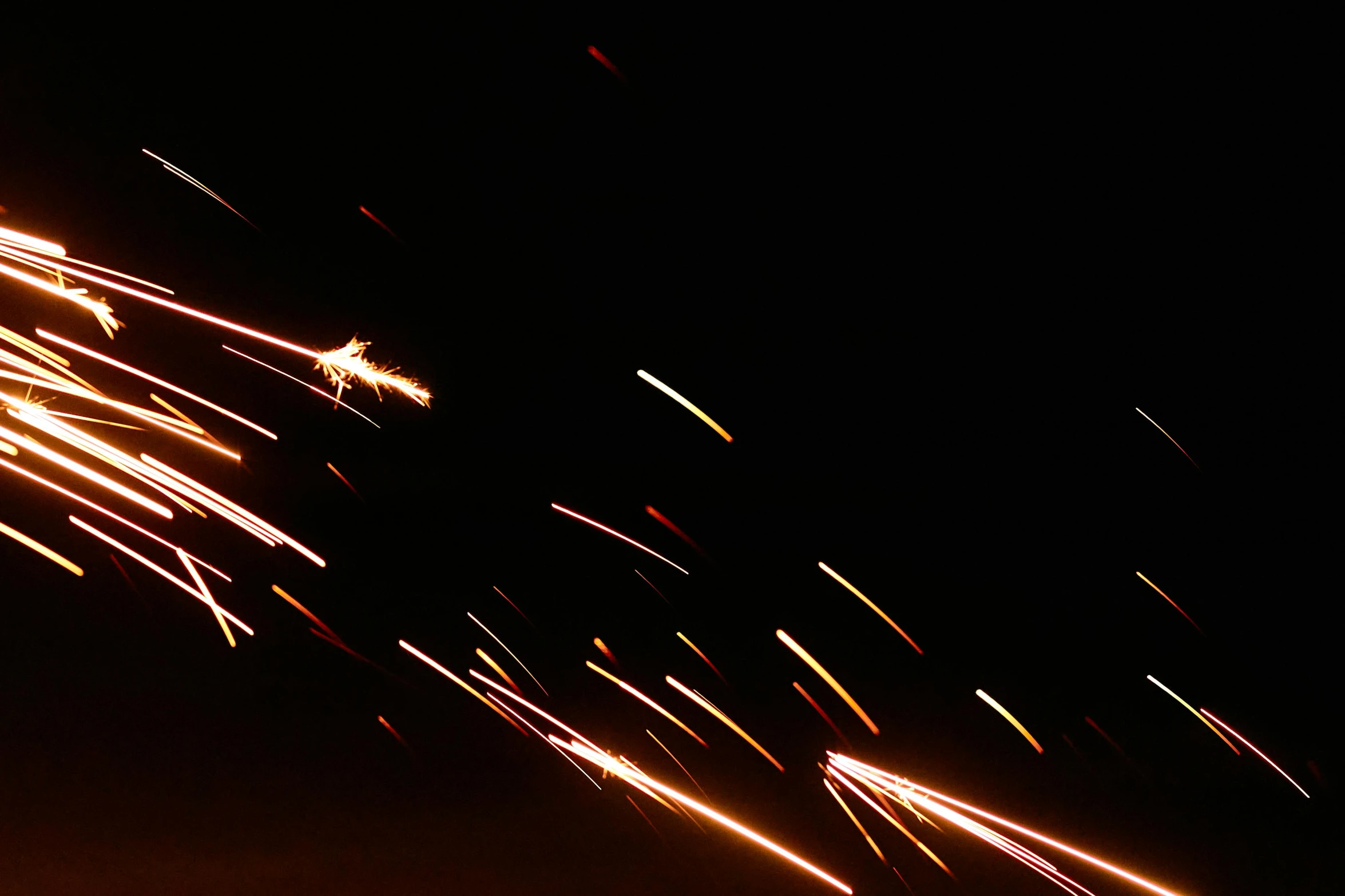 a firework is lit up in the dark, by Jan Rustem, unsplash, light and space, traffic with light trails, messy lines, high definition screenshot, abstract lighting