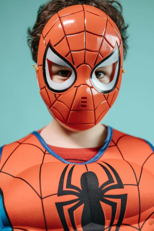 a close up of a person wearing a spider - man mask, a picture, softplay, body armour, official product photo, for kids