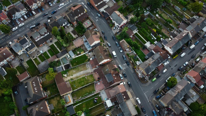 a bird's eye view of a residential area, an album cover, unsplash, paul davey, high polygon, cinematic footage