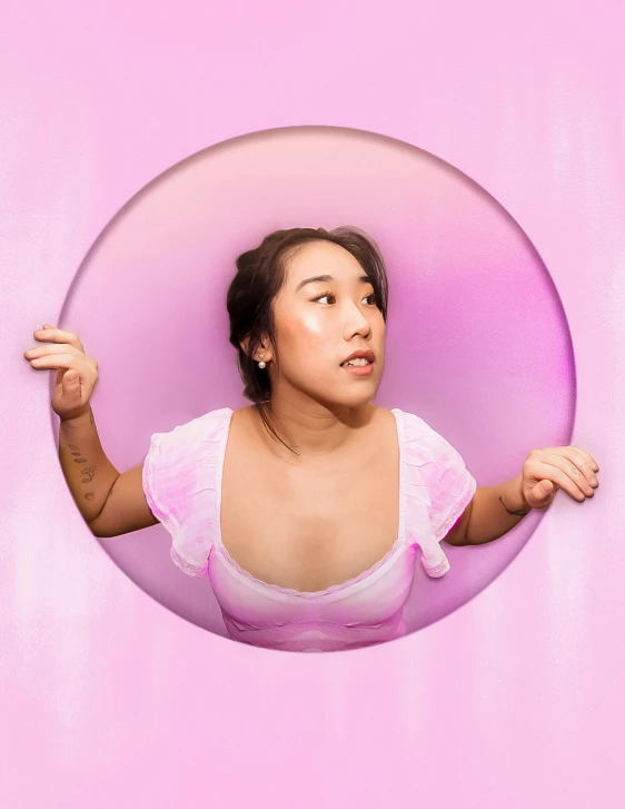 a woman looking through a hole in a pink wall, an album cover, inspired by helen huang, magical realism, her belly button is exposed, pokimane, ( ( theatrical ) ), inflatable