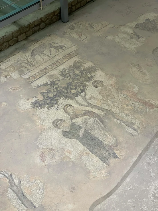 a stone floor with a painting on it, date trees, low quality photo, roman historic works, random detail