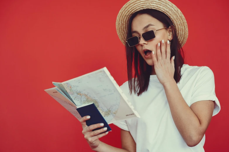 a woman talking on a cell phone while holding a map, pexels contest winner, red sunglasses, passport photo, plain background, frank moth