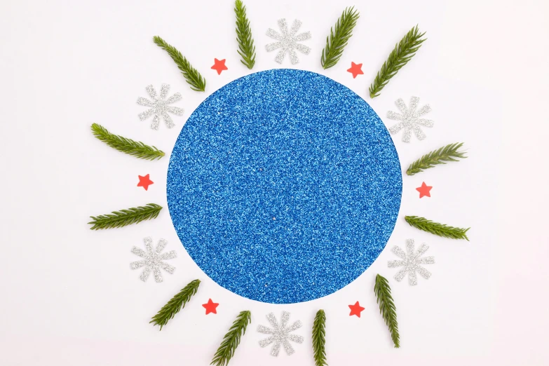 a blue circle surrounded by pine branches and snowflakes, inspired by Yves Klein, trending on reddit, land art, glitter background, star craft, world tree, bright sunny day