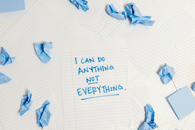 a note that says i can do anything not everything, an album cover, inspired by Tracey Emin, unsplash, conceptual art, tissue paper art, wearing blue, mental health, hyper realist