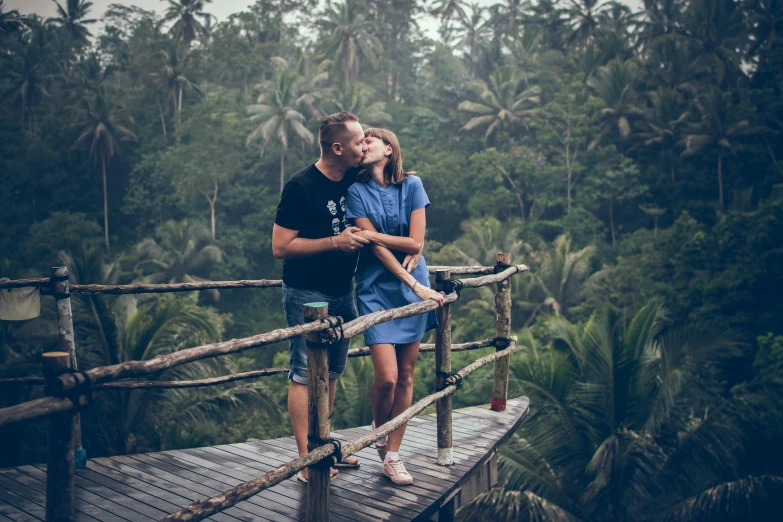 a man and a woman kissing on a bridge, pexels contest winner, tropical jungle, avatar image, blank, vista view