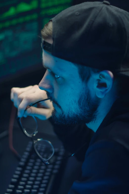 a man sitting in front of a computer monitor, by artist, realism, discord profile picture, team ibuypower, deep in thought, performing a music video