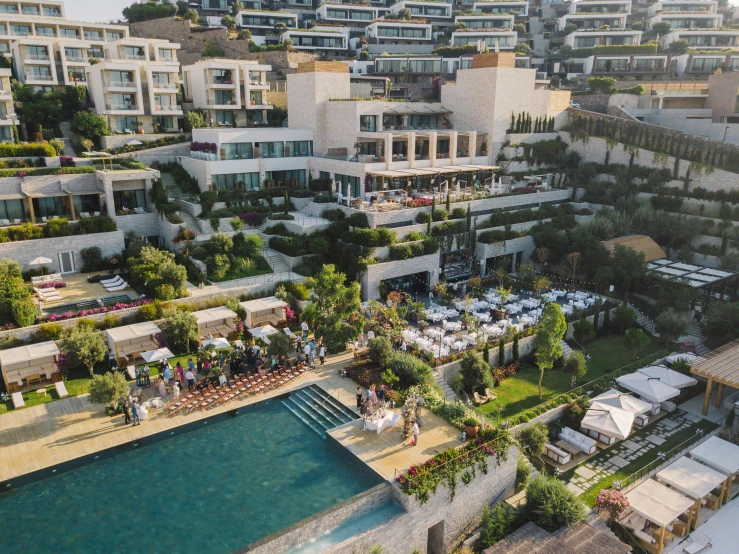 an aerial view of a resort with a swimming pool, a digital rendering, pexels contest winner, renaissance, city on a hillside, lebanon kirsten dunst, wedding, performance