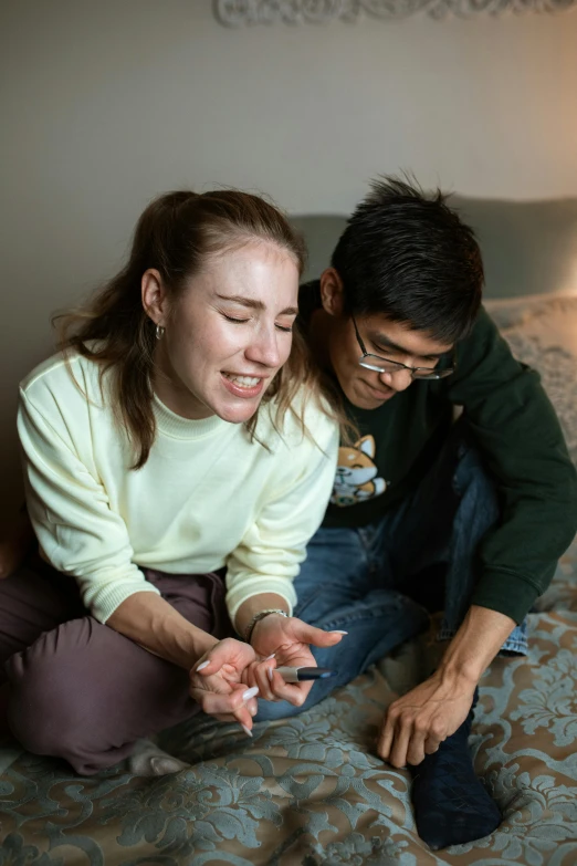 a couple of people sitting on top of a bed, by Washington Allston, trending on reddit, partially cupping her hands, lee griggs and jason chan, high resolution photo, supportive