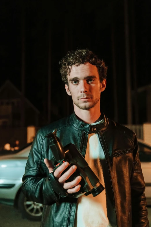 a man in a leather jacket holding a gun, holding wine bottle, connor hibbs, profile image, eng kilian