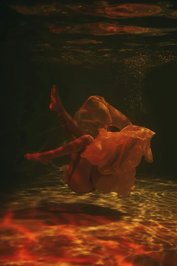 a woman floating under water in a dress, an album cover, inspired by Brooke Shaden, unsplash contest winner, flowing salmon-colored silk, ultrafine detail ”, medium format. soft light, ignant