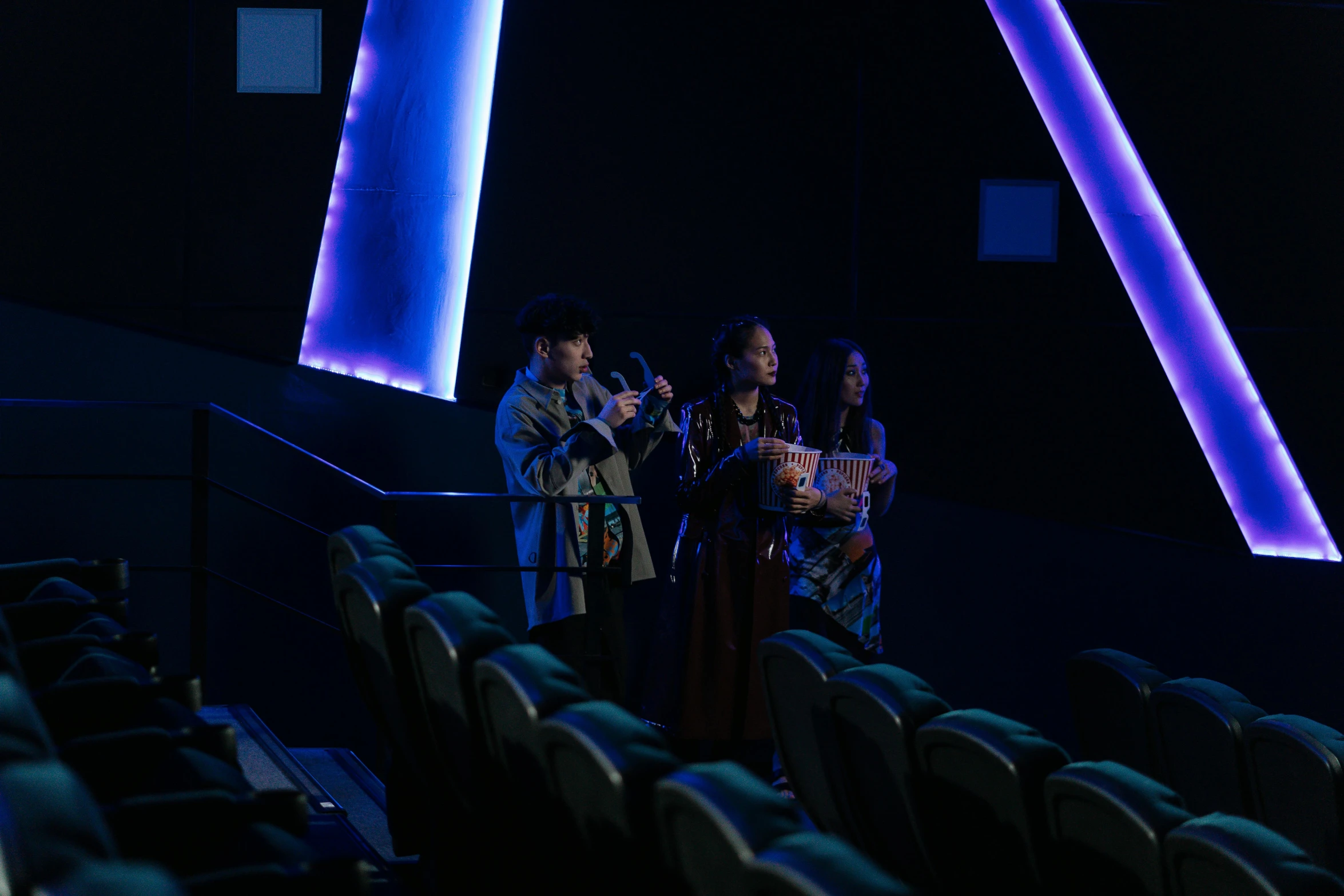 a group of people standing next to each other on a stage, a hologram, an instrument, gongbi, shot with sony alpha 1 camera, gaming