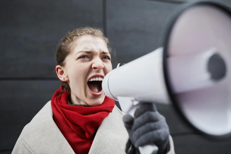 a woman screaming with a megaphone in her hand, by Niko Henrichon, shutterstock, renaissance, instagram post, royal commission, protest, larynx