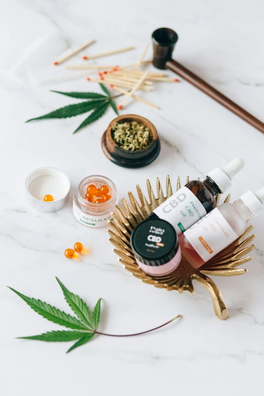 an assortment of cannabis products sitting on top of a table, by Julia Pishtar, detailed product image, mid body, liquified, product view