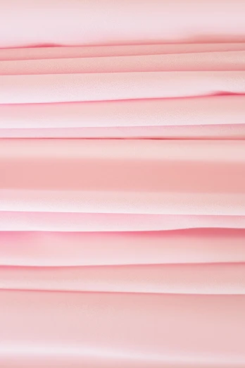 pink sheets of paper stacked on top of each other, inspired by Peter Alexander Hay, unsplash, flowing realistic fabric, seamless micro detail, bubblegum body, detailed product image