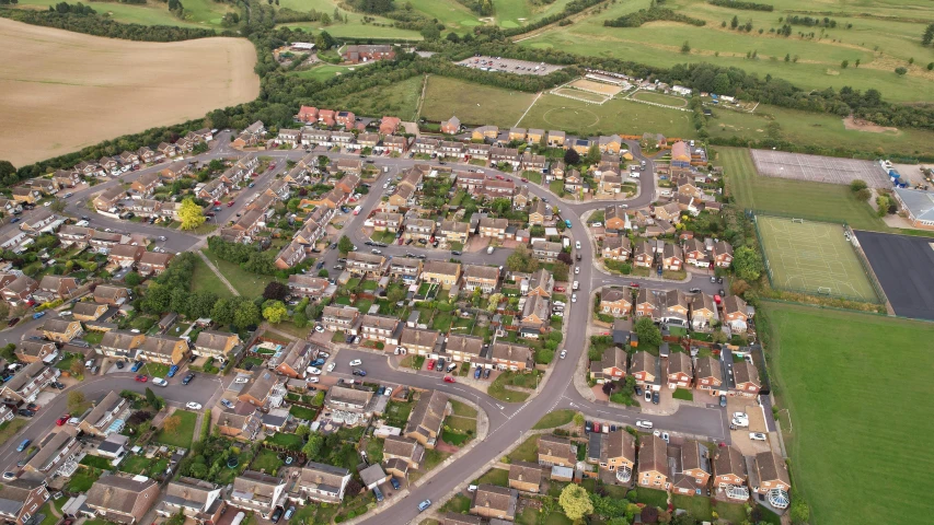 a bird's eye view of a small town, by Julian Allen, suburbia street, raf grassetti, detailed 4k photograph, madgwick