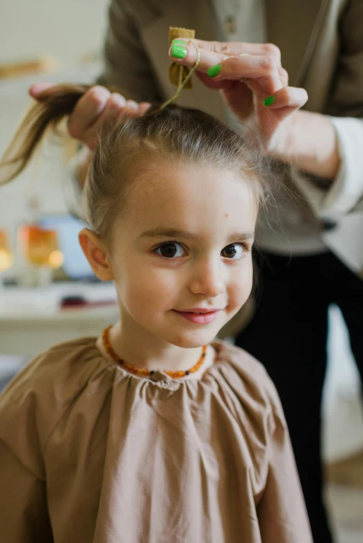 a little girl is getting her hair done, pexels contest winner, process art, caring fatherly wide forehead, half length, thumbnail, professionally color graded