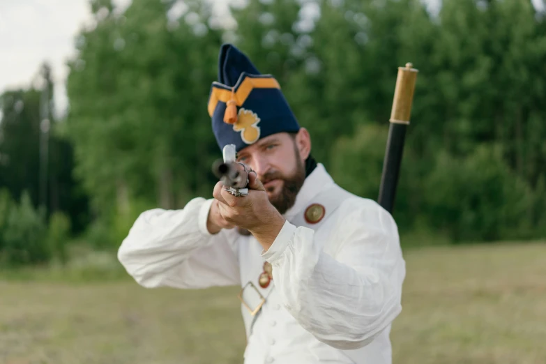 a man holding a baseball bat on top of a field, a portrait, inspired by Horace Vernet, unsplash, renaissance, full dress uniform, firing a gun, looking into the camera, norrlandsskog