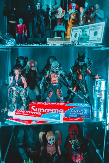 a bunch of action figures that are on a shelf, a screenshot, by Sebastian Vrancx, unsplash, maximalism, predator 2, wolf in hell, fridge, low quality photo