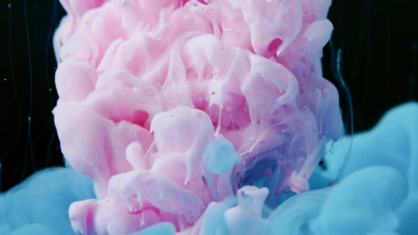 a close up of a pink and blue substance, inspired by Kim Keever, trending on pexels, made of candy, pink iconic character, inks, cmyk