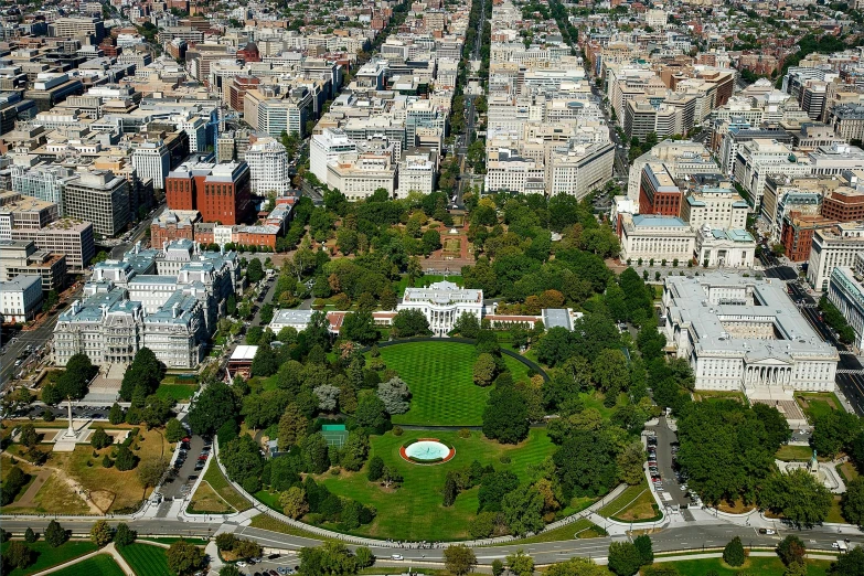 a view of a city from a bird's eye view, by Dennis Flanders, white house, park on a bright sunny day, promo image, washington