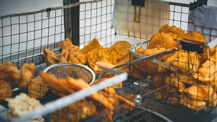 a couple of baskets filled with fried food, unsplash, square, meat factory, background image, sasai ukon masanao