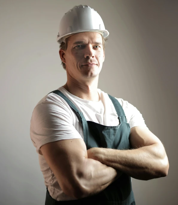 a man wearing a hard hat and overalls, very buff, arms crossed, adam duff lucidpixul, david noren