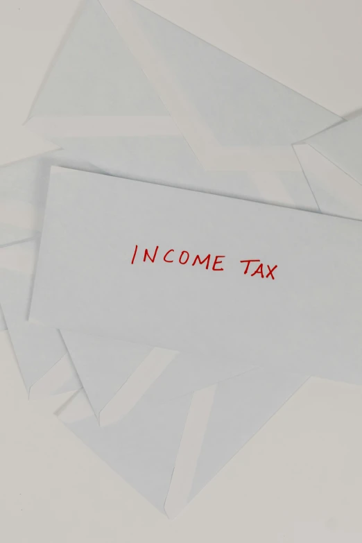 a pile of white envelopes with the words income tax written on them, an album cover, jakob rozalski, digital image, hi-res, m