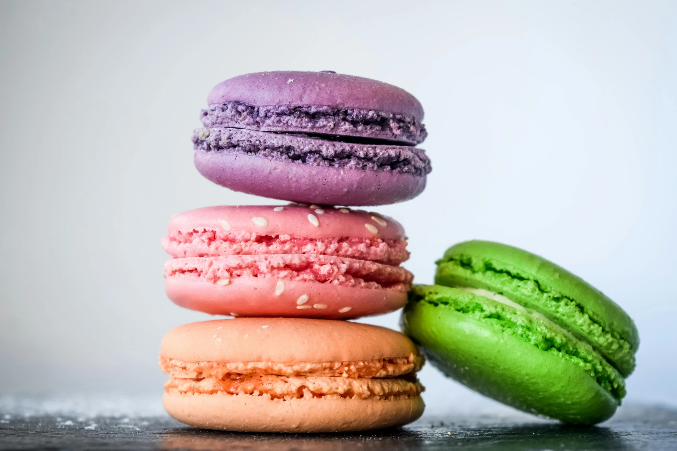 a stack of macarons sitting on top of a table, a portrait, pexels, brilliantly coloured, halo halo halo halo 8k, thumbnail, three michelin star