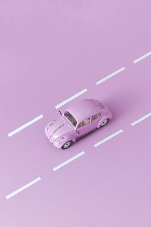 a pink toy car sitting on top of a road, by Cornelisz Hendriksz Vroom, pexels contest winner, magic realism, violet beetles, flat lay, 15081959 21121991 01012000 4k, soft aesthetic