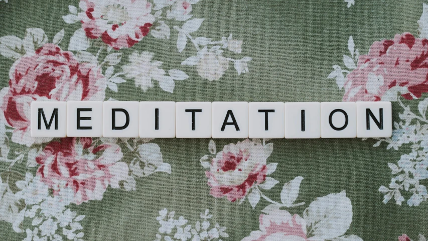 a wooden block with the word meditation spelled on it, by Daniel Lieske, pixabay, aestheticism, wearing floral chiton, emma bridgewater and paperchase, defibrillator, solitude