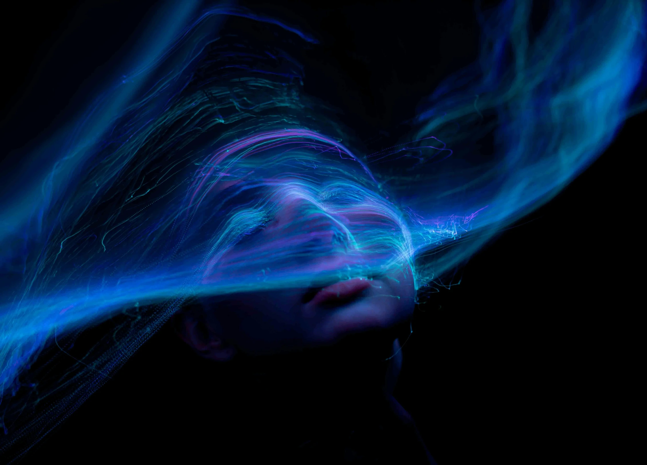 a woman with her hair blowing in the wind, a hologram, by Adam Marczyński, pexels contest winner, holography, blue bioluminescence, abstract face, lines of energy, in the astral plane ) ) )