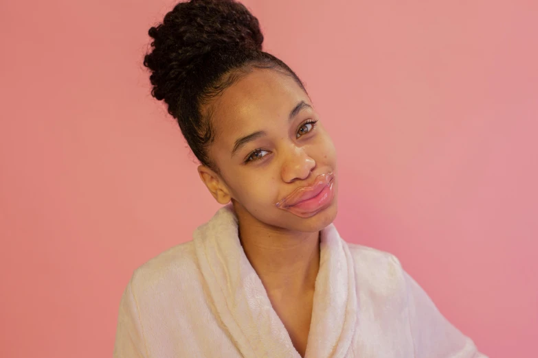 a close up of a person wearing a robe, by Dulah Marie Evans, featured on instagram, happening, big puffy lips, facial scar, face mask, cute complexion