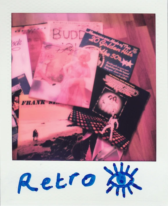 a polaroid picture of a bunch of records, a polaroid photo, unsplash, retrofuturism, risograph!!!, 2 0 0 0 s cover art