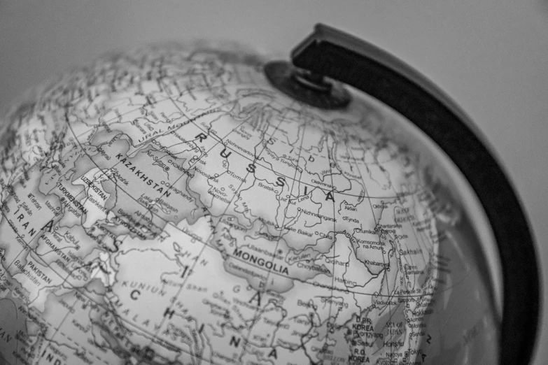 a black and white photo of a globe, by Emma Andijewska, sanctions in russia, map, 15081959 21121991 01012000 4k, closeup portrait