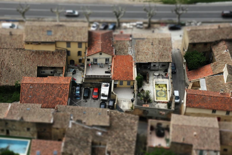 a bird's eye view of a small town, a tilt shift photo, pexels contest winner, photorealism, lourmarin, city rooftop, hyperrealism”, square