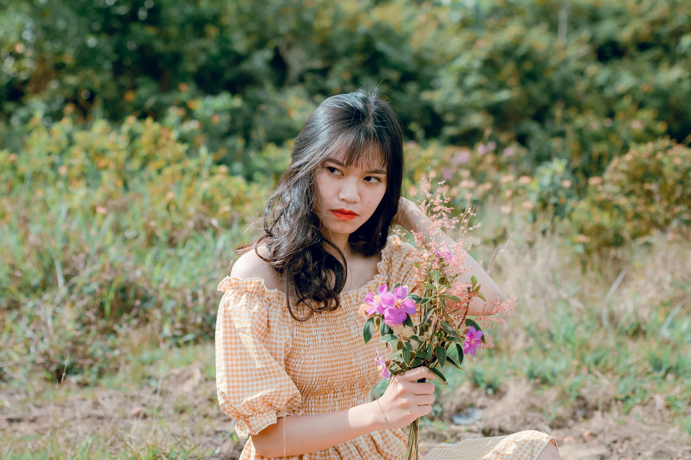 a woman holding a bunch of flowers in a field, by Tan Ting-pho, pexels contest winner, realism, handsome girl, ulzzang, avatar image, small