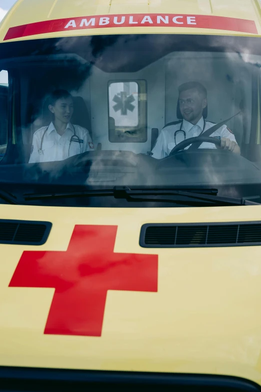 a yellow ambulance with a red cross on the front, by Dan Frazier, slide show, documentary, square, camaraderie
