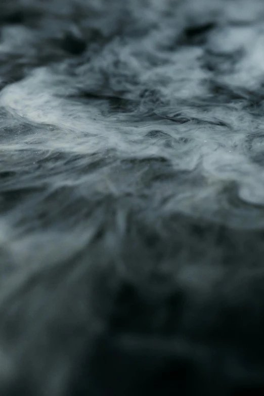 a black and white photo of a body of water, pexels contest winner, lyrical abstraction, background ( smoke, 4 k close up, colored fog, cinematic closeup