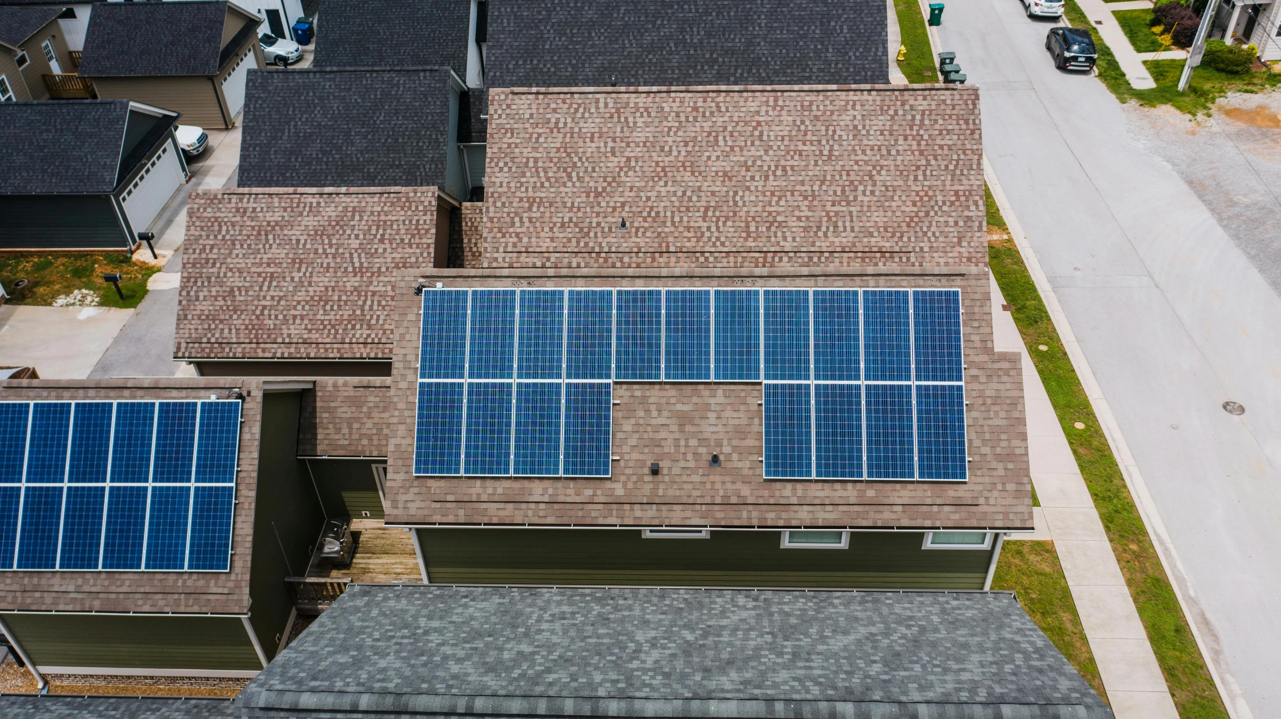 a house with solar panels on the roof, bird's eye overhead shot, photo taken with provia, ballard, up close