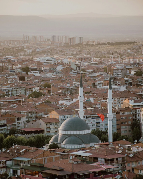 a view of a city from the top of a hill, an album cover, by Ismail Acar, unsplash contest winner, hurufiyya, he is in a mosque, byzantine, panoramic view, high quality screenshot