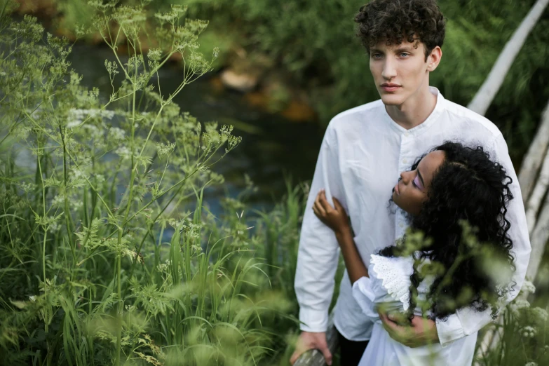 a man and a woman standing next to each other, inspired by William-Adolphe Bouguereau, unsplash, foliage clothing, imaan hammam, white sleeves, production still